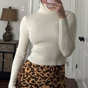 Ribbed Cream Turtleneck Sweater